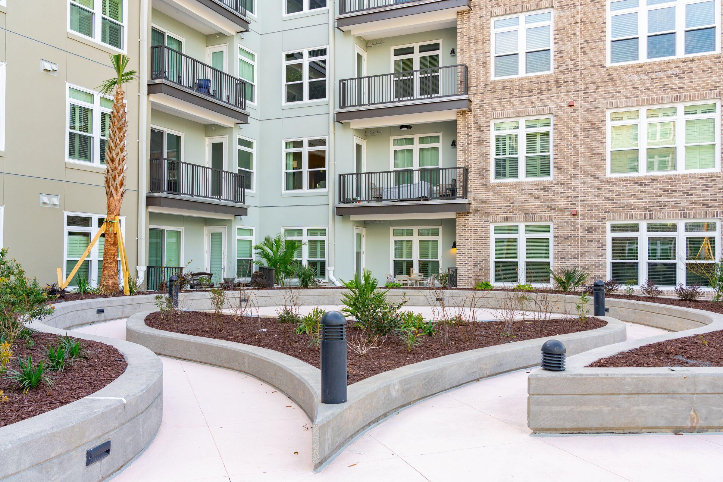 145 Pier View Street, Unit 114 Charleston, SC 29492 - Photo 4 of 41 4. Garden Looking at Patio