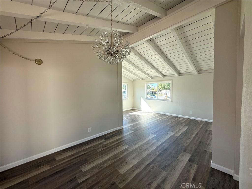 3445 Sparrow Circle Riverside, CA 92503 - Photo 12 of 41 en empty room with wooden floor and windows