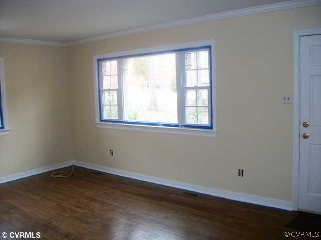 14121 Beach Road Chesterfield, VA 23838 - Photo 3 of 14 a view of a room with wooden floor and windows
