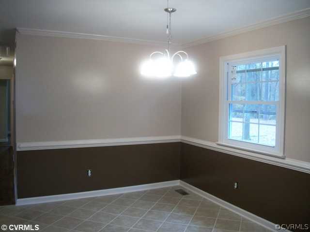 14121 Beach Road Chesterfield, VA 23838 - Photo 7 of 14 a view of an empty room with a window