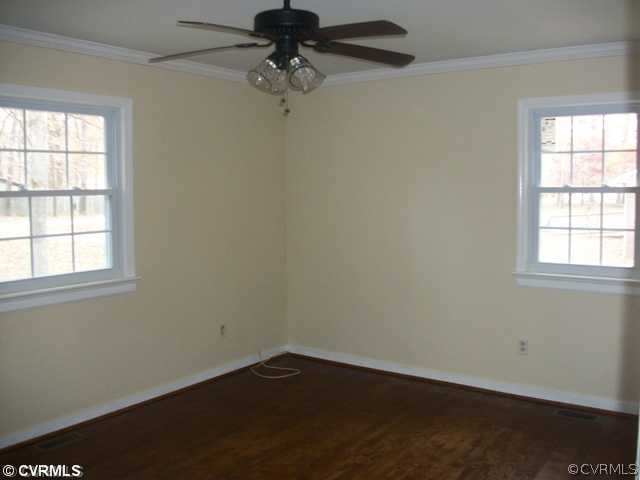 14121 Beach Road Chesterfield, VA 23838 - Photo 8 of 14 an empty room with a window