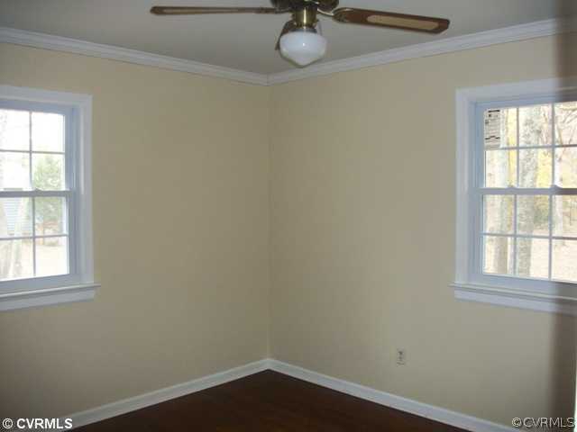 14121 Beach Road Chesterfield, VA 23838 - Photo 9 of 14 an empty room with a window