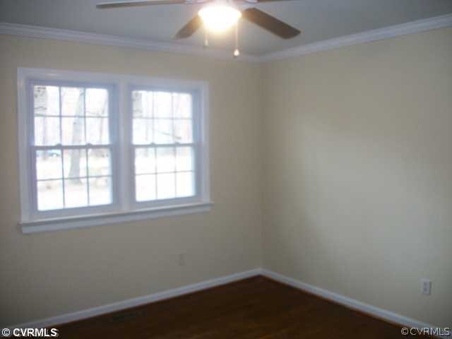 14121 Beach Road Chesterfield, VA 23838 - Photo 10 of 14 an empty room with a window
