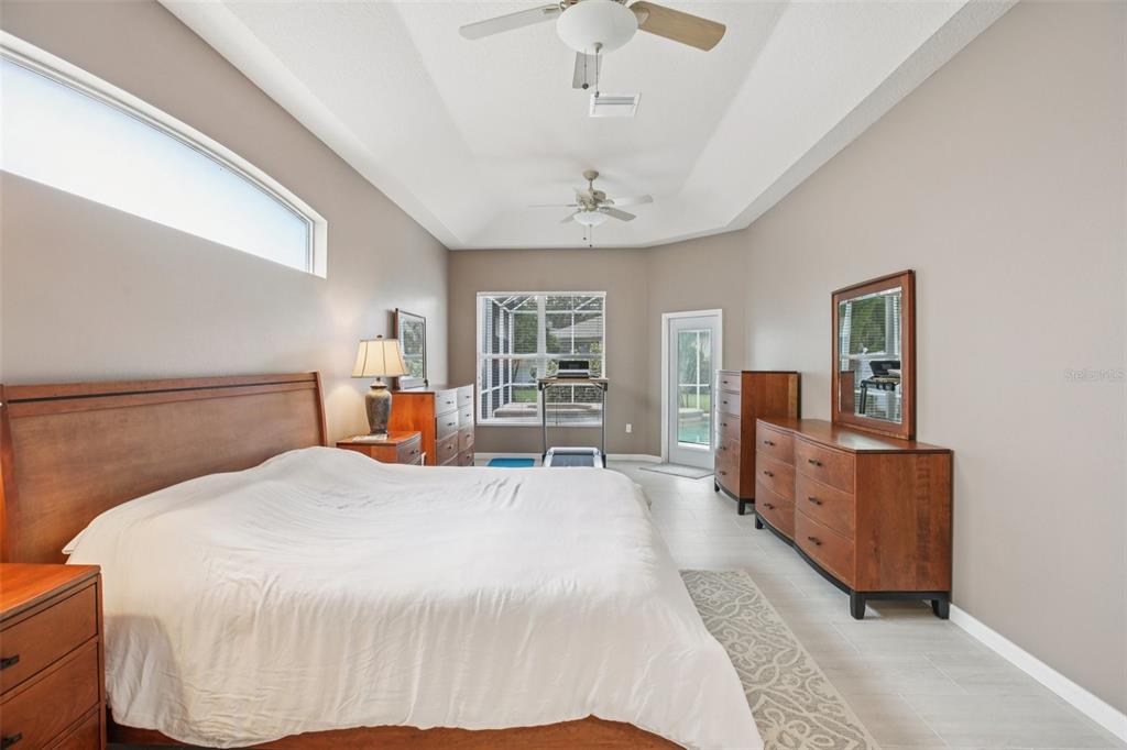 2903 Mossy Timber Trail Valrico, FL 33596 - Photo 15 of 39 a bed room with a bed and furniture