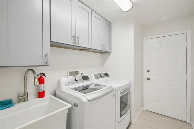 a room with furniture a rug and a window