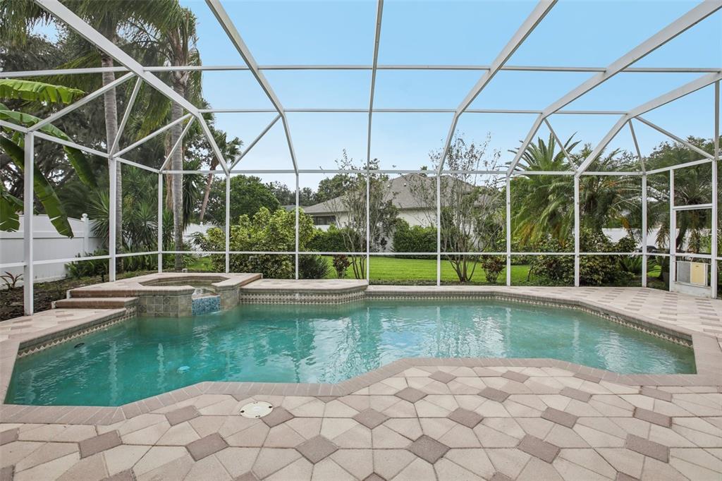 2903 Mossy Timber Trail Valrico, FL 33596 - Photo 2 of 39 a view of a backyard with a swimming pool