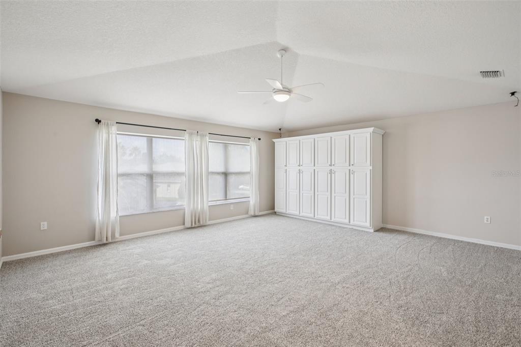 2903 Mossy Timber Trail Valrico, FL 33596 - Photo 26 of 39 a view of an empty room with a window