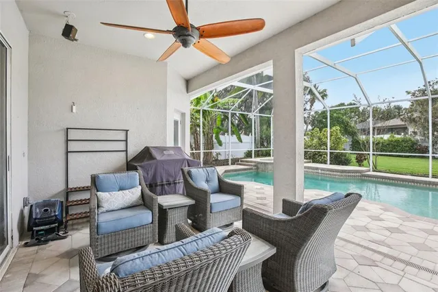 a view of a swimming pool with a patio