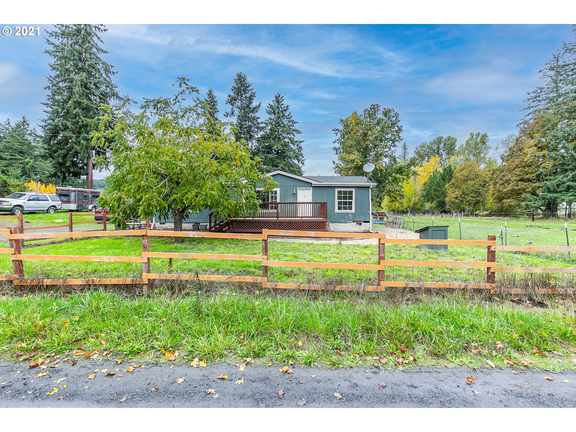 38075 Wheeler Road Dexter, OR 97431 - Photo 1 of 32 a view of a house with a big yard