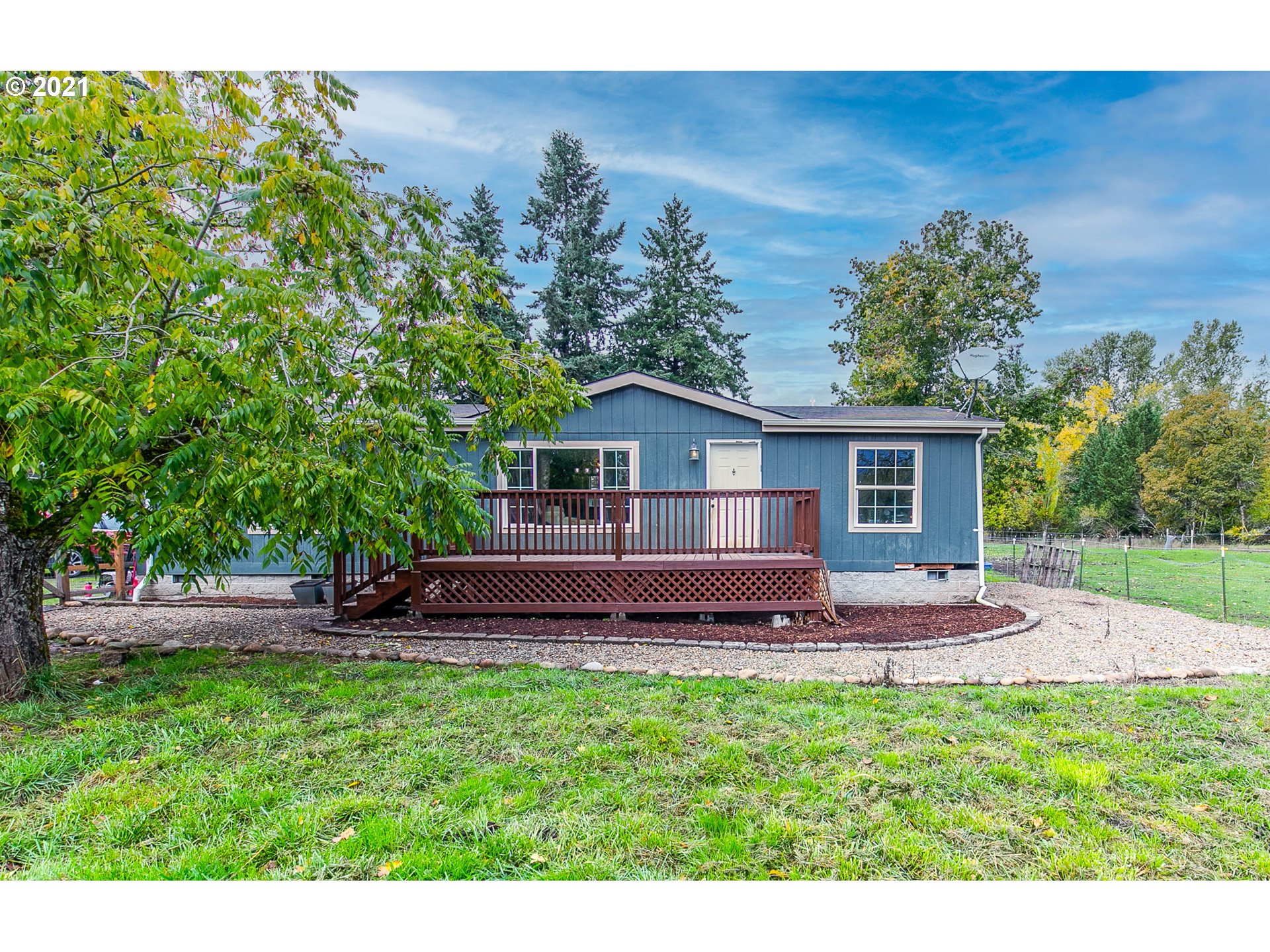 38075 Wheeler Road Dexter, OR 97431 - Photo 6 of 32 a view of front of a house with a yard