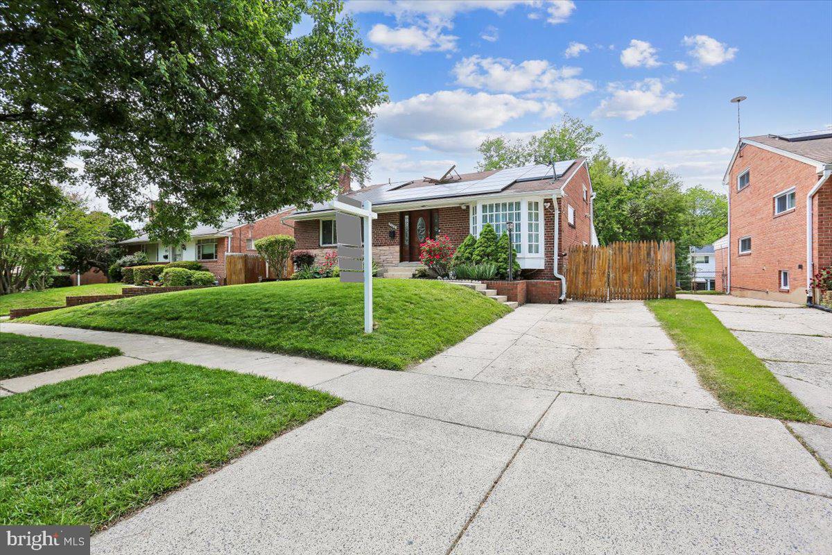 3709 Kenway Street Silver Spring, MD 20906 - Photo 29 of 34 front view of a house with a yard