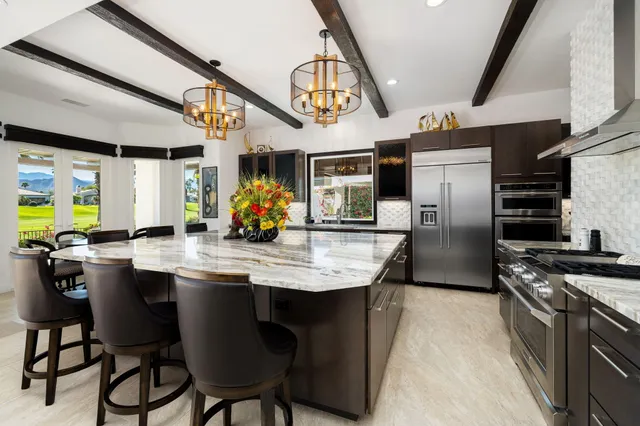 a living room with furniture flat screen tv and a fireplace