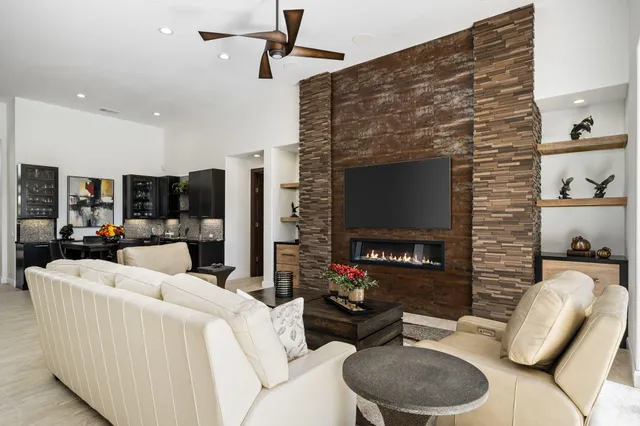 a bathroom with a shower sink and mirror