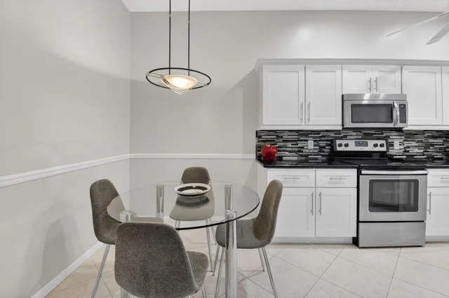 a bathroom with a sink double vanity and a mirror