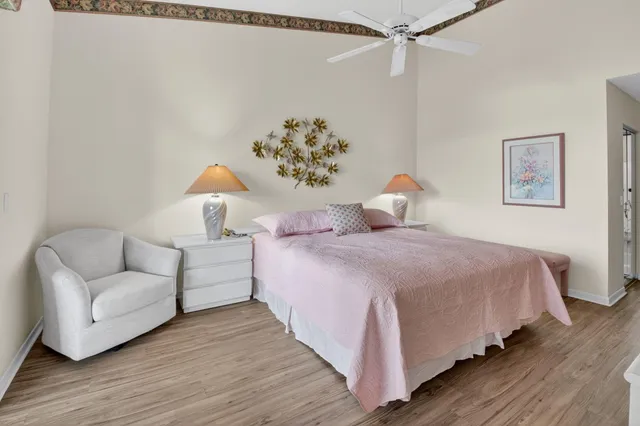 a bathroom with a shower sink and mirror