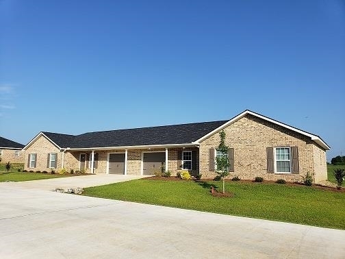 a view of house with outdoor space and street view
