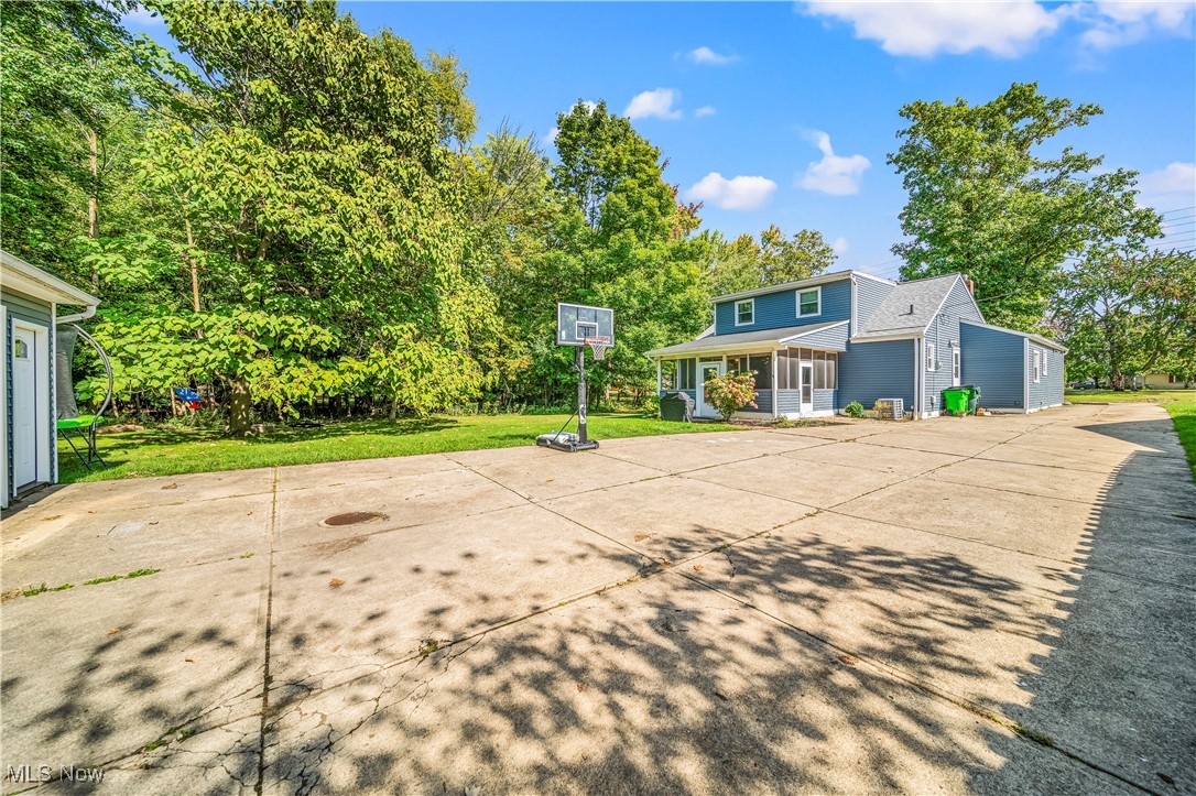 1796 Lander Road Mayfield Heights, OH 44124 - Photo 39 of 39 View of sport court with a yard