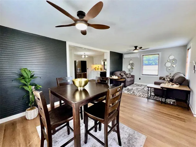 a view of a dining room with furniture