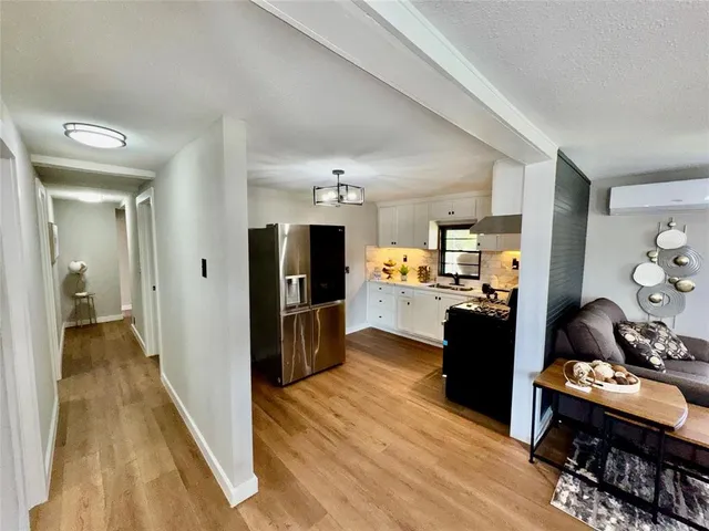 a view of a living room and dining room