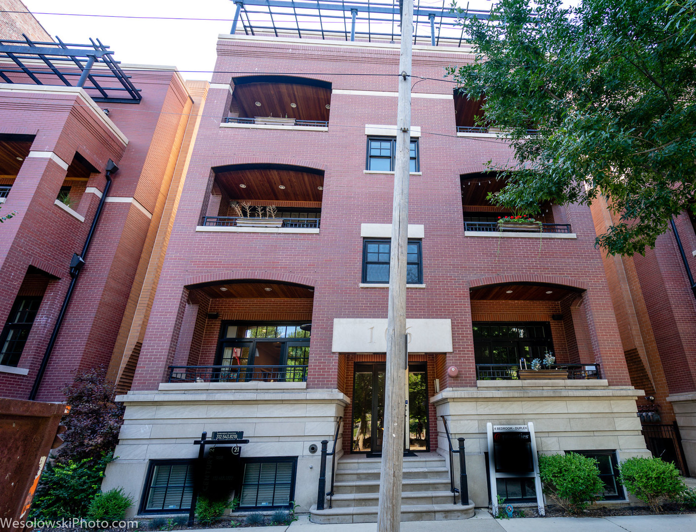 106 South Sangamon Street, Unit 2N Chicago, IL 60607 - Photo 1 of 27 front view of a building