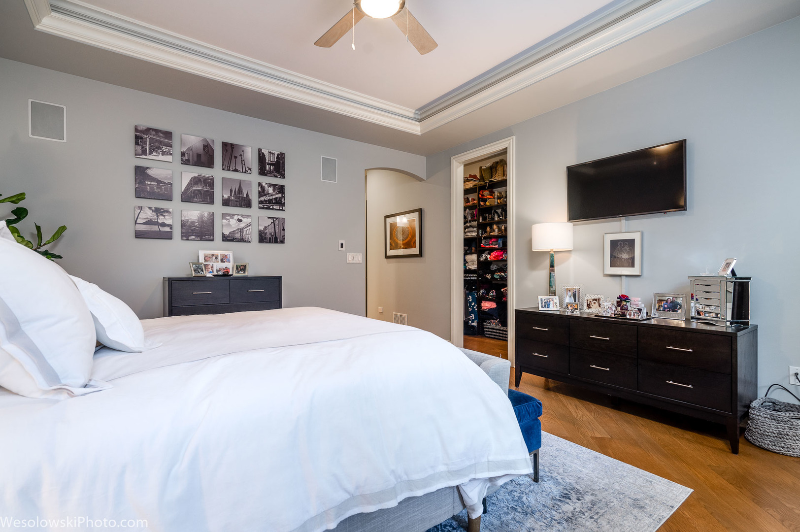 106 South Sangamon Street, Unit 2N Chicago, IL 60607 - Photo 11 of 27 a bedroom with a bed and a flat tv screen on dresser