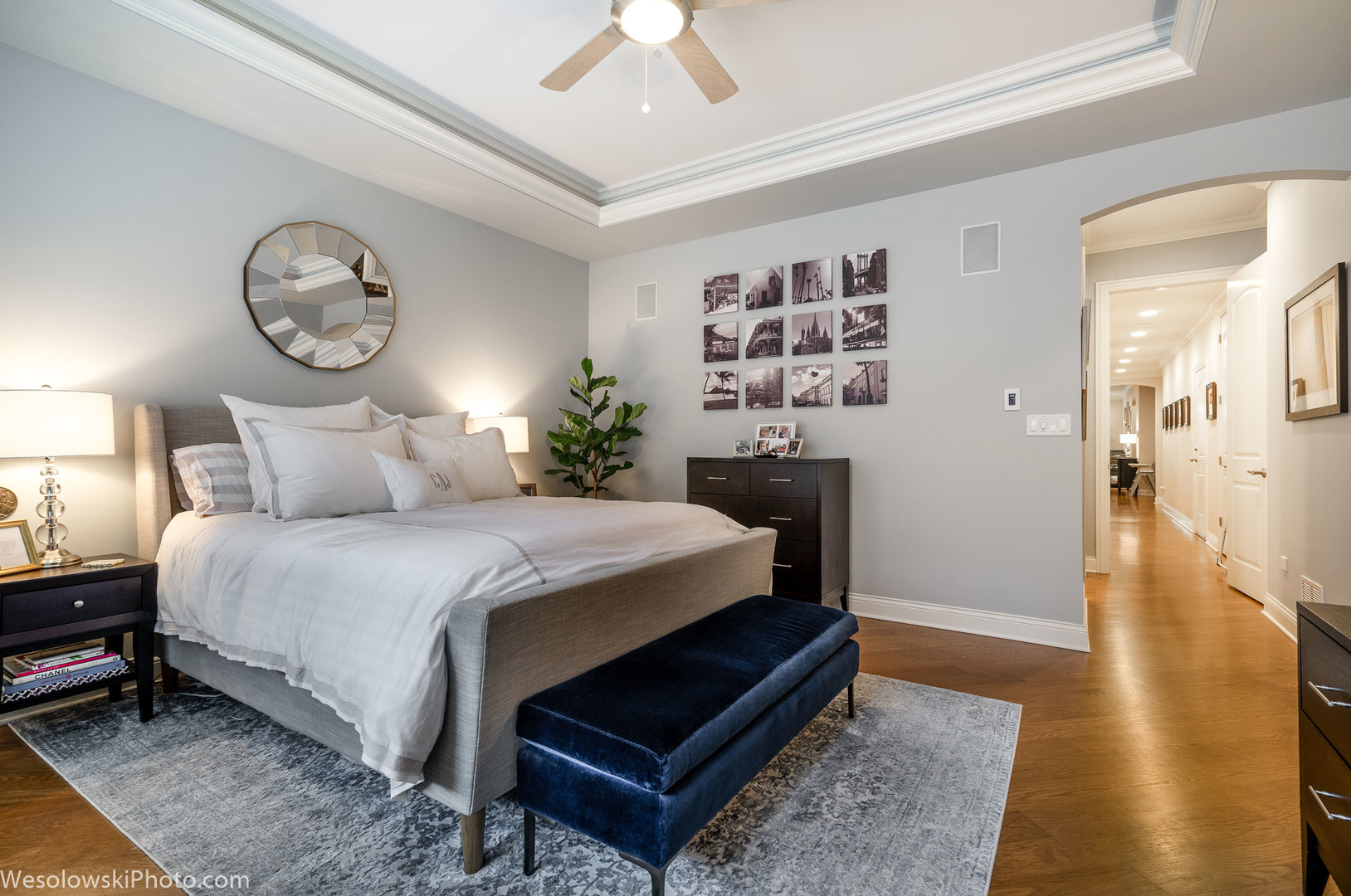 106 South Sangamon Street, Unit 2N Chicago, IL 60607 - Photo 12 of 27 a bedroom with a bed table and a chandelier