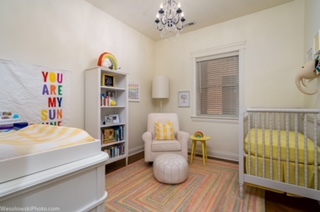 106 South Sangamon Street, Unit 2N Chicago, IL 60607 - Photo 19 of 27 a bedroom with a bed and a wooden floor