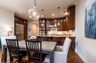 106 South Sangamon Street, Unit 2N Chicago, IL 60607 - Photo 5 of 27 a view of a dining room with furniture and wooden floor