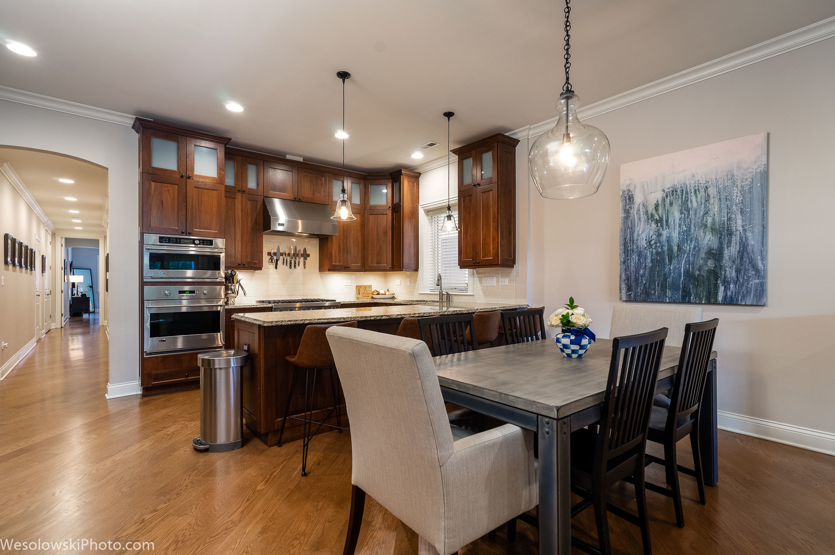 106 South Sangamon Street, Unit 2N Chicago, IL 60607 - Photo 6 of 27 a view of a dining room and livingroom with furniture wooden floor a chandelier