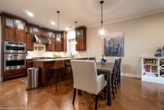 106 South Sangamon Street, Unit 2N Chicago, IL 60607 - Photo 8 of 27 a dining room with furniture and wooden floor