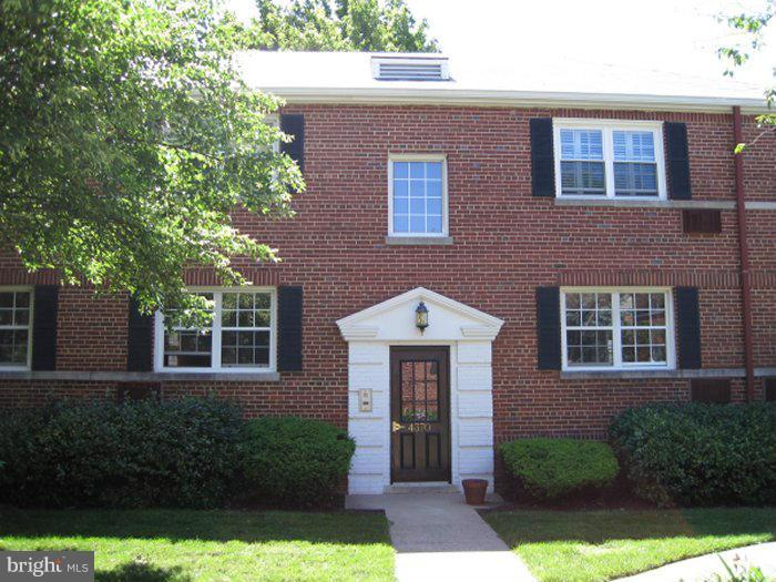 4370 North Pershing Drive, Unit 2 Arlington, VA 22203 - Photo 1 of 17 a front view of a house with yard and glass windows