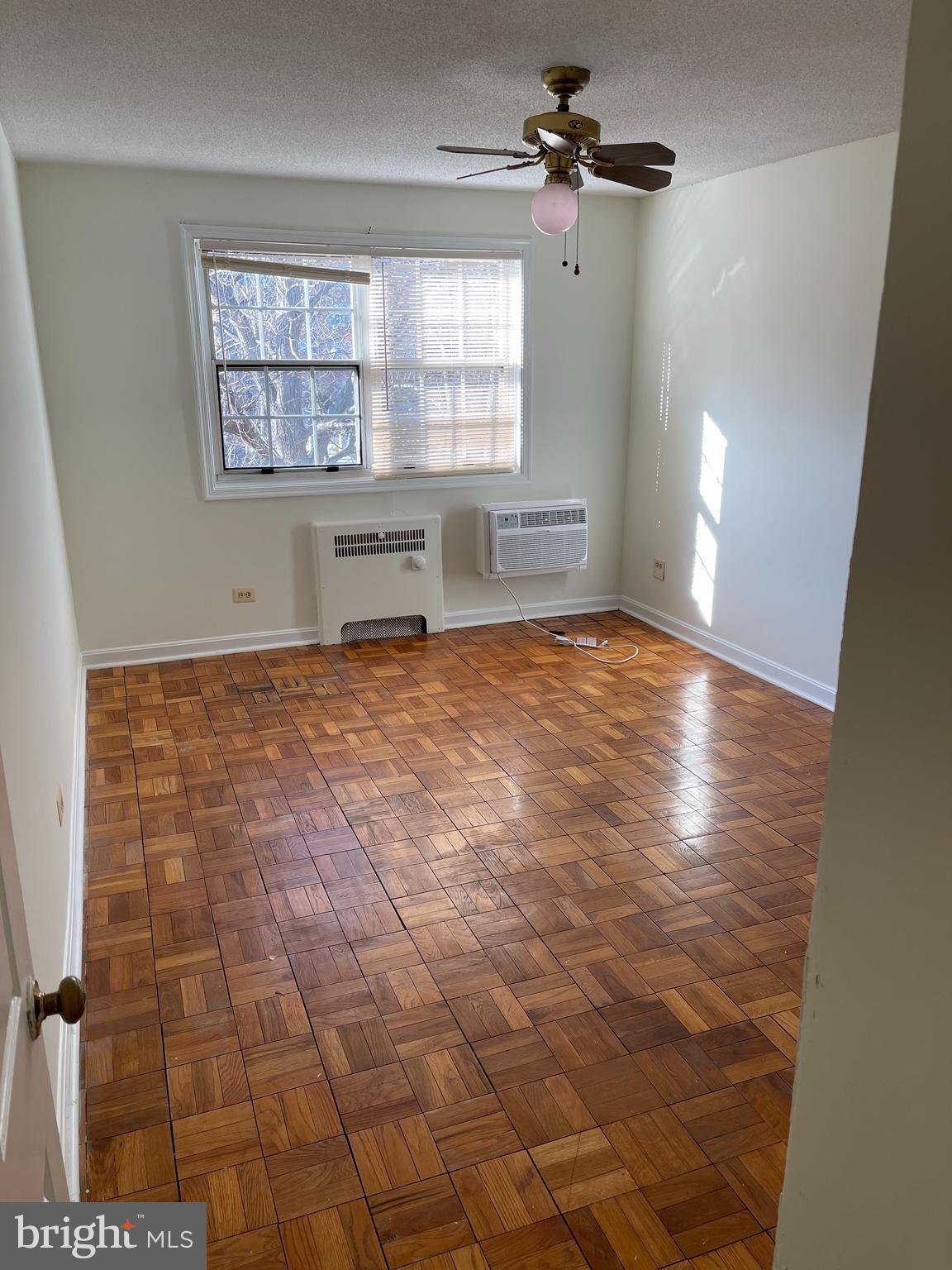 4370 North Pershing Drive, Unit 2 Arlington, VA 22203 - Photo 15 of 17 a view of an empty room with a window