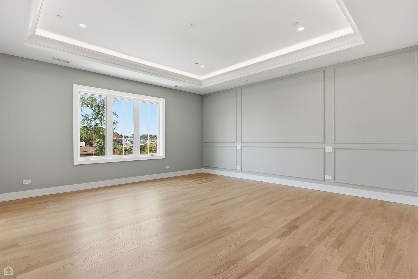 1220 Courtland Avenue Park Ridge, IL 60068 - Photo 15 of 32 an empty room with wooden floor and windows