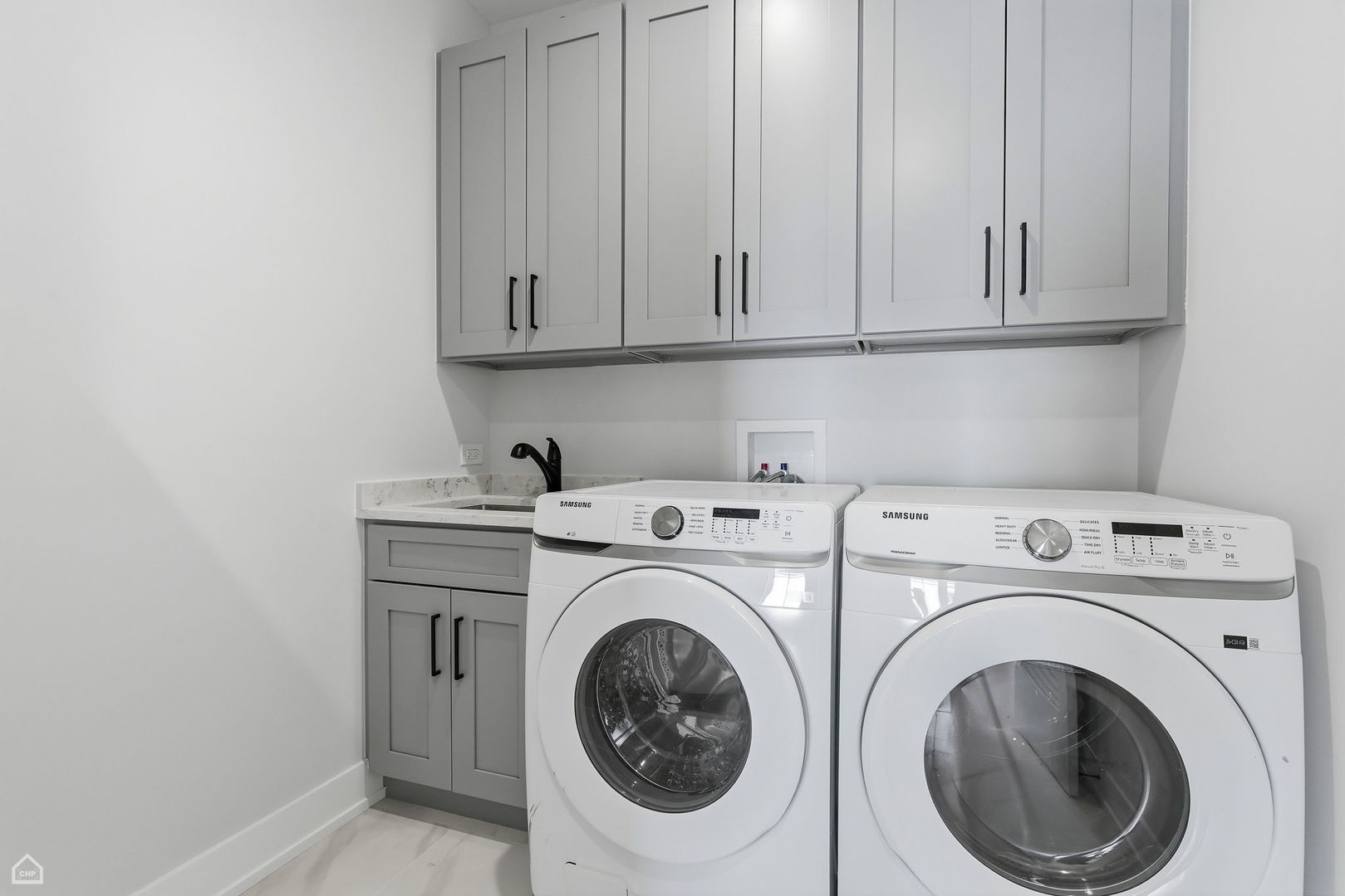 1220 Courtland Avenue Park Ridge, IL 60068 - Photo 20 of 32 a utility room with dryer and washer