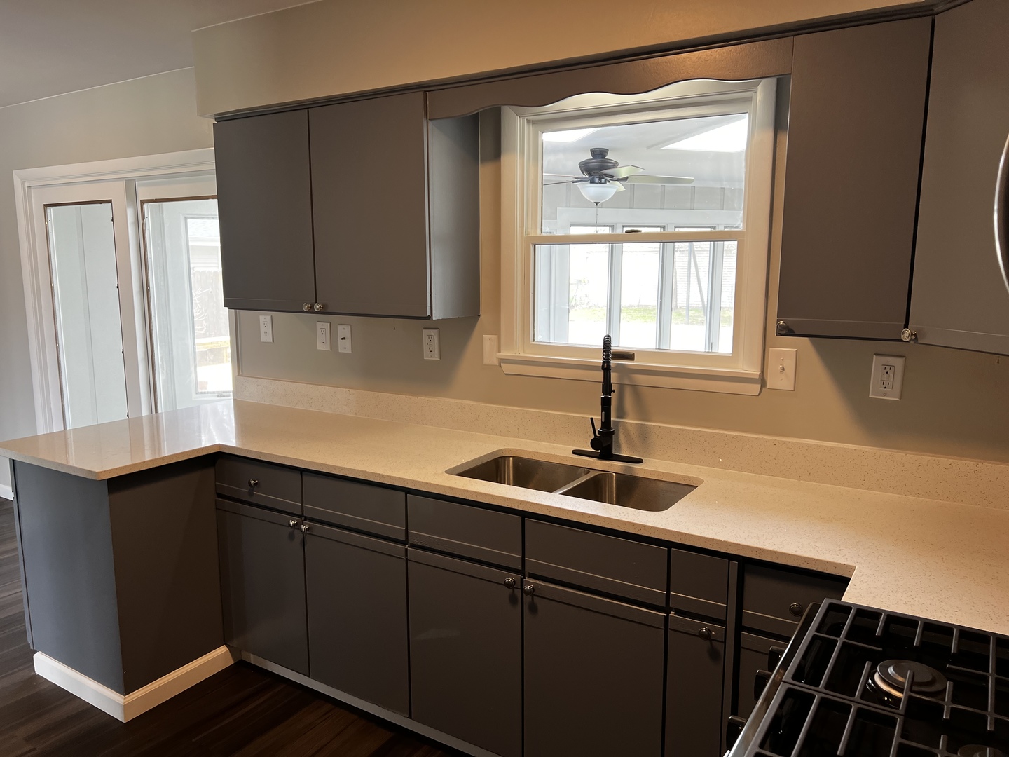 121 Wendell Place DeKalb, IL 60115 - Photo 13 of 35 a kitchen with a sink and cabinets