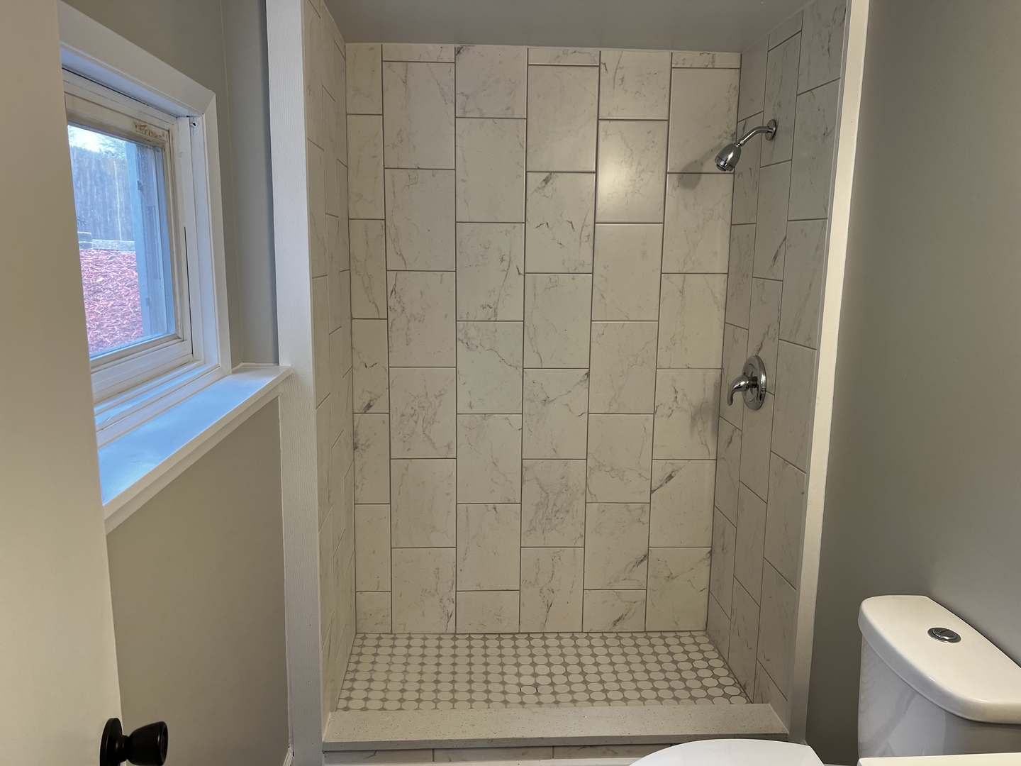 121 Wendell Place DeKalb, IL 60115 - Photo 22 of 35 a bathroom with a shower