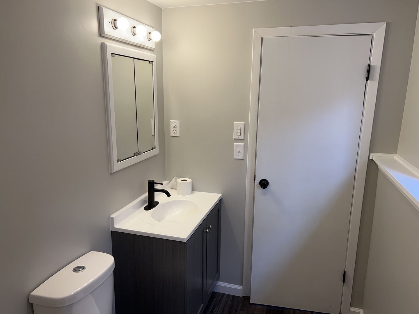 121 Wendell Place DeKalb, IL 60115 - Photo 24 of 35 a bathroom with a sink mirror and toilet