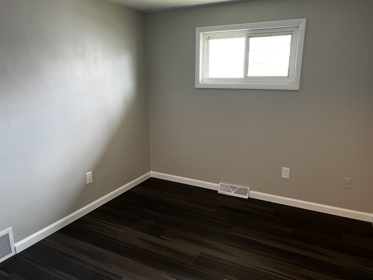 121 Wendell Place DeKalb, IL 60115 - Photo 25 of 35 a view of a small space with wooden floor and a window