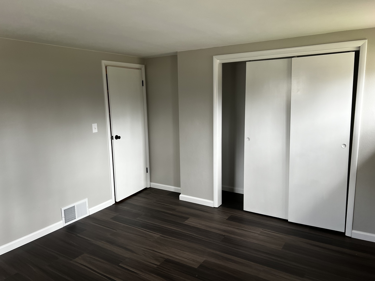121 Wendell Place DeKalb, IL 60115 - Photo 26 of 35 an empty room with wooden floor and closet
