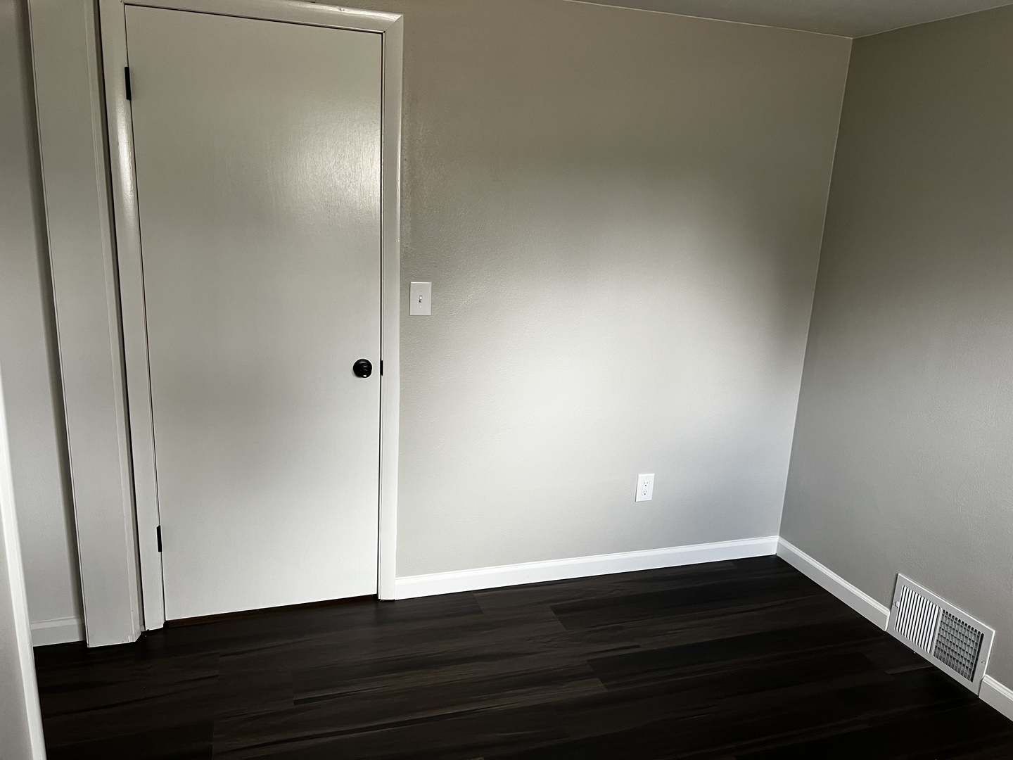 121 Wendell Place DeKalb, IL 60115 - Photo 28 of 35 a view of an empty room with wooden floor