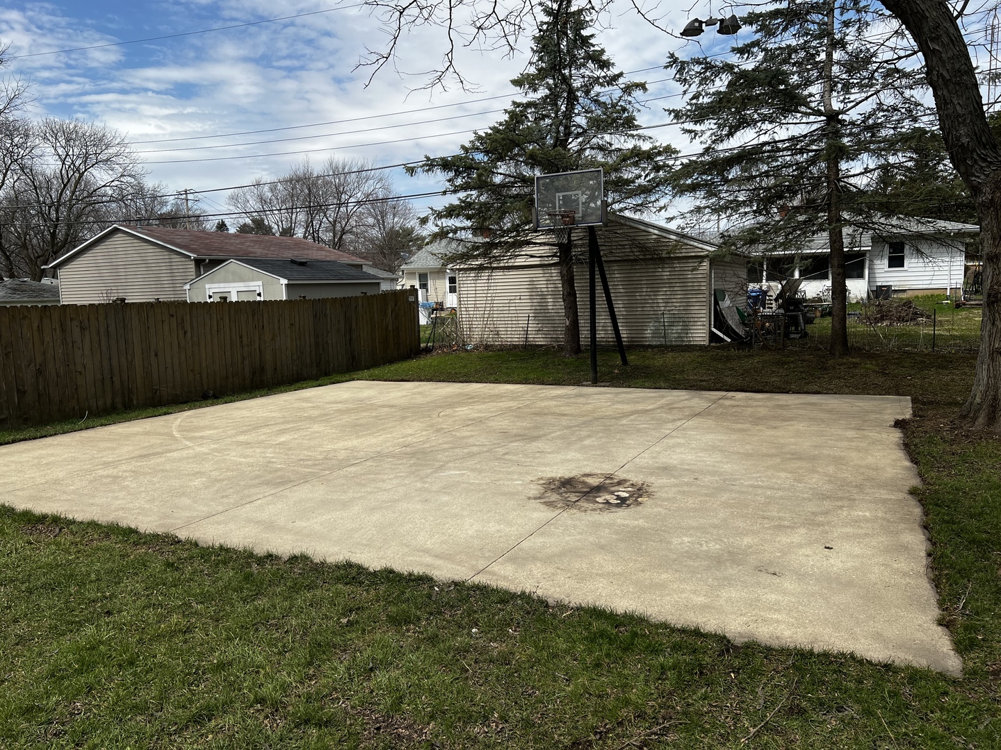 121 Wendell Place DeKalb, IL 60115 - Photo 5 of 35 a view of swimming pool with a yard and large tree