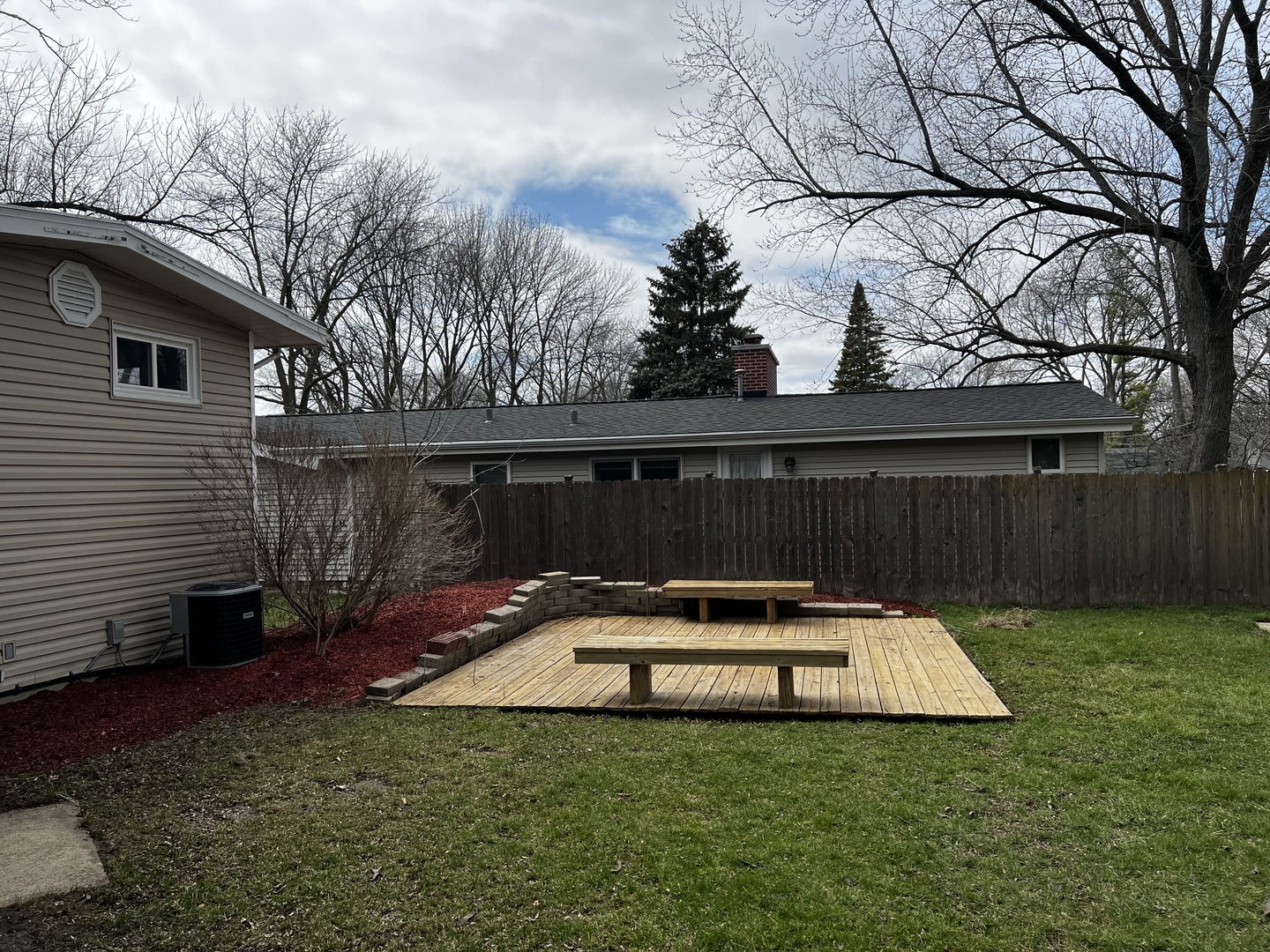 121 Wendell Place DeKalb, IL 60115 - Photo 6 of 35 a view of backyard with a small cabin