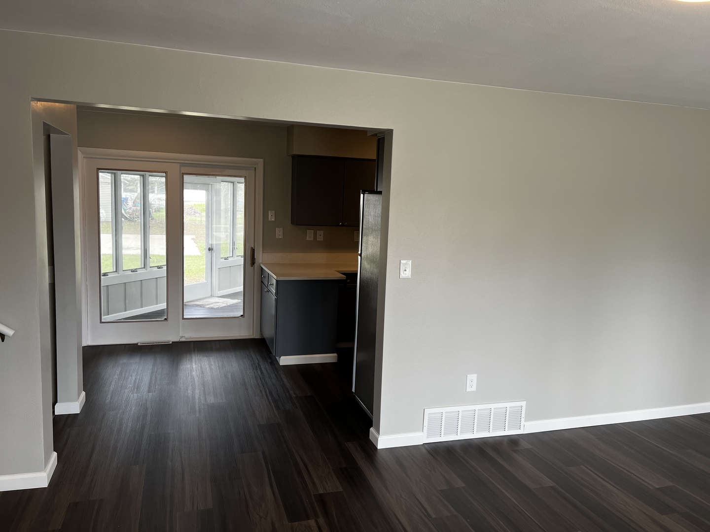 121 Wendell Place DeKalb, IL 60115 - Photo 8 of 35 wooden floor in an empty room with a window