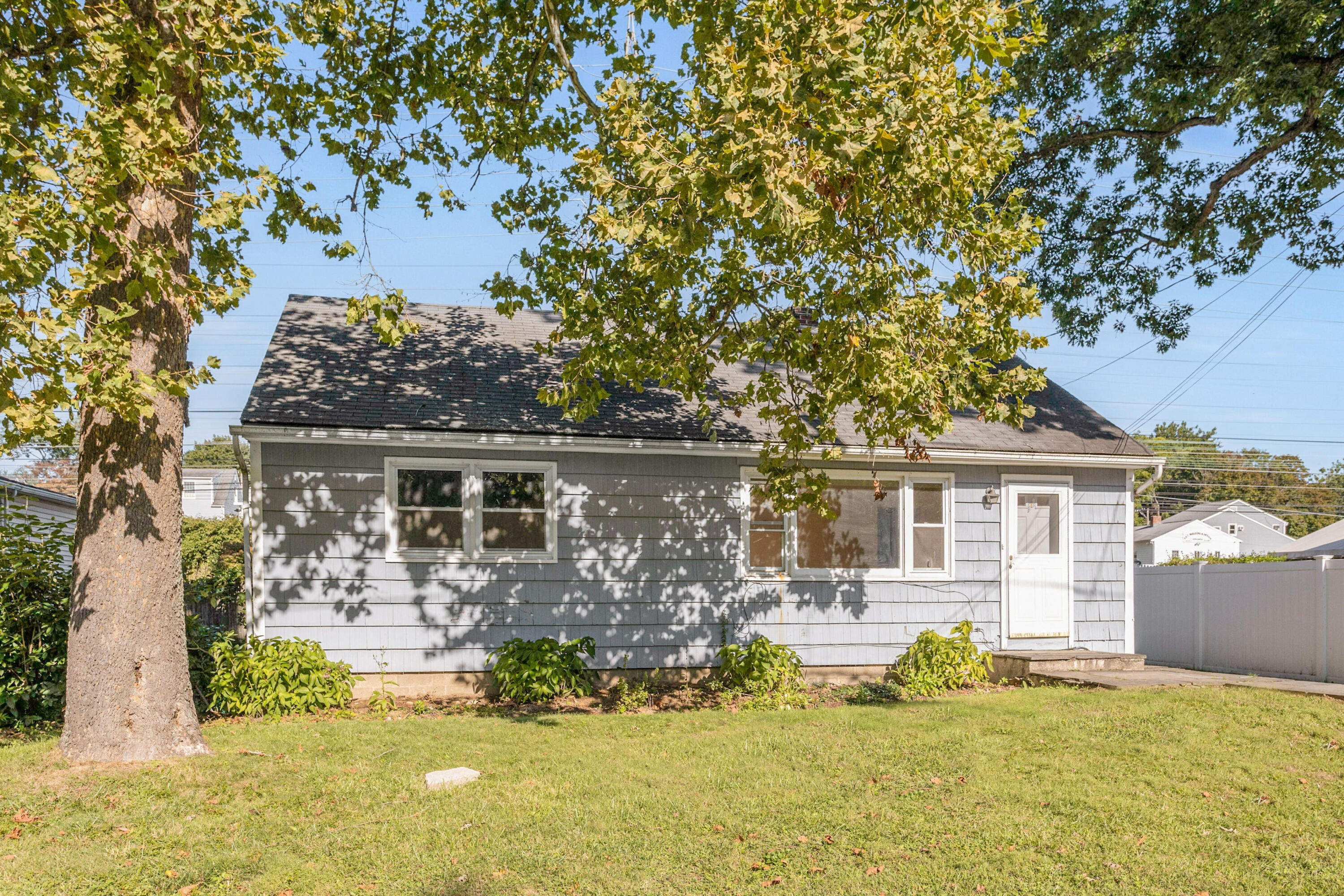 18 Ledge Road Darien, CT 06820 - Photo 1 of 16 front view of a house with a yard