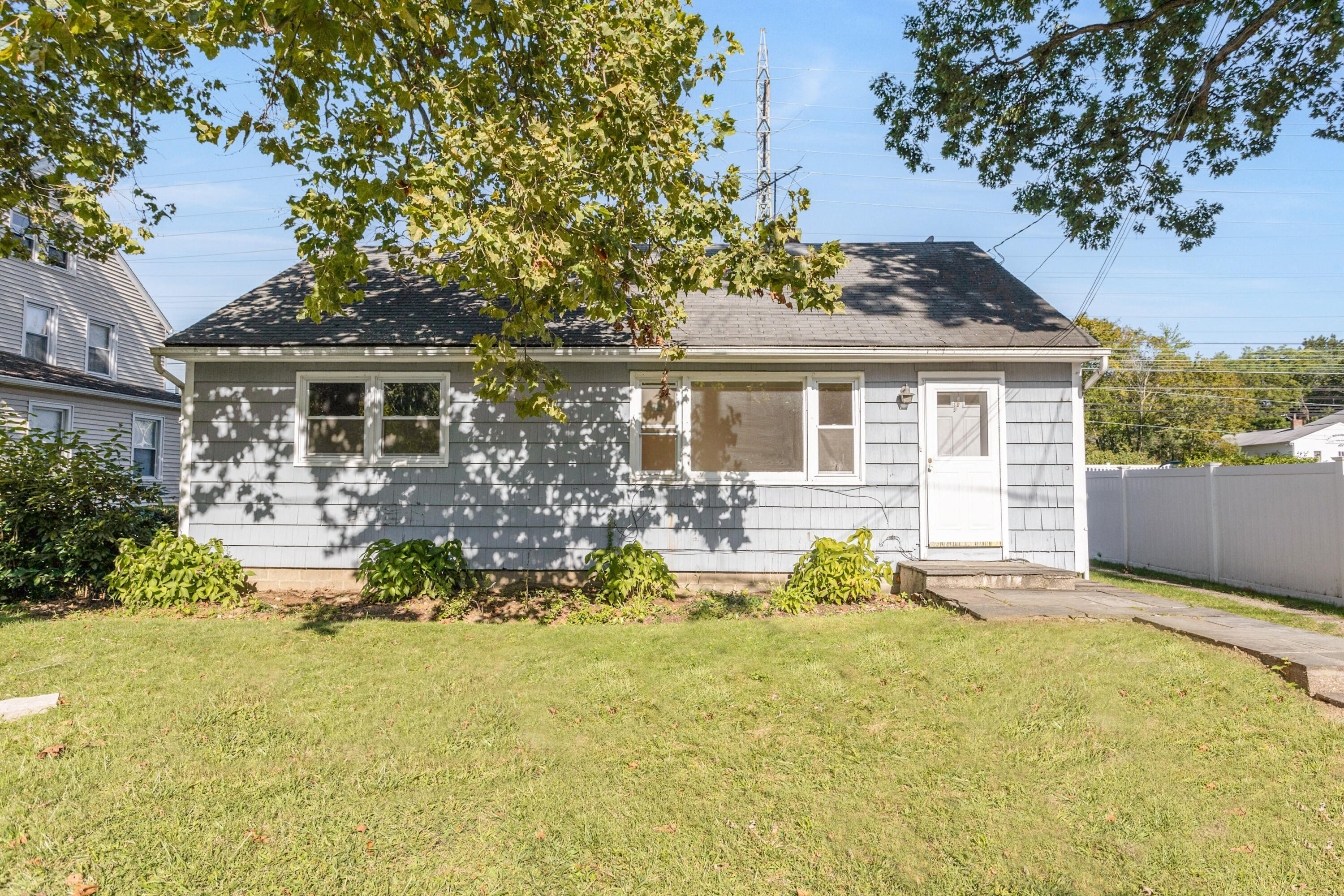 18 Ledge Road Darien, CT 06820 - Photo 2 of 16 a front view of a house with swimming pool and porch
