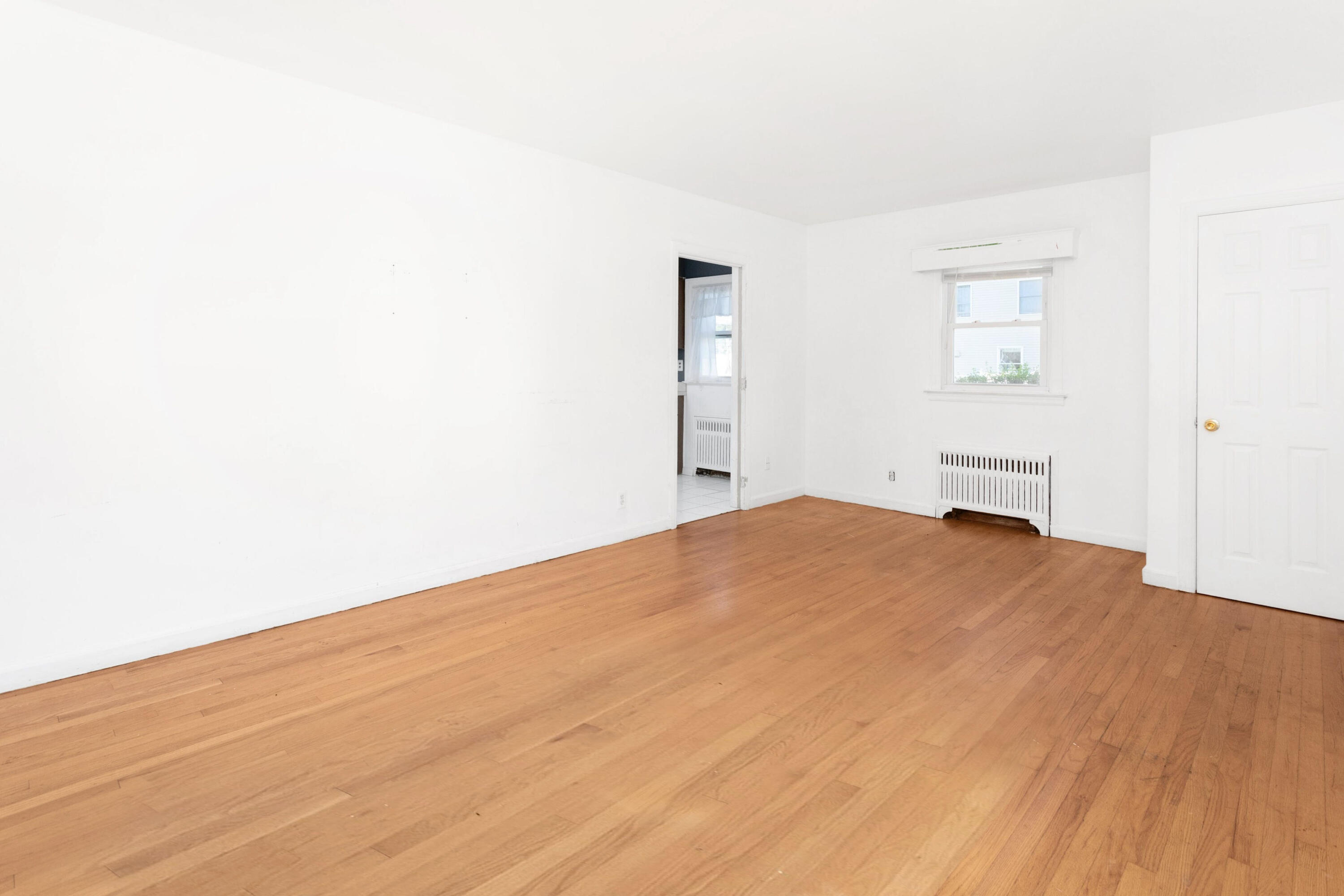18 Ledge Road Darien, CT 06820 - Photo 6 of 16 a view of empty room with wooden floor