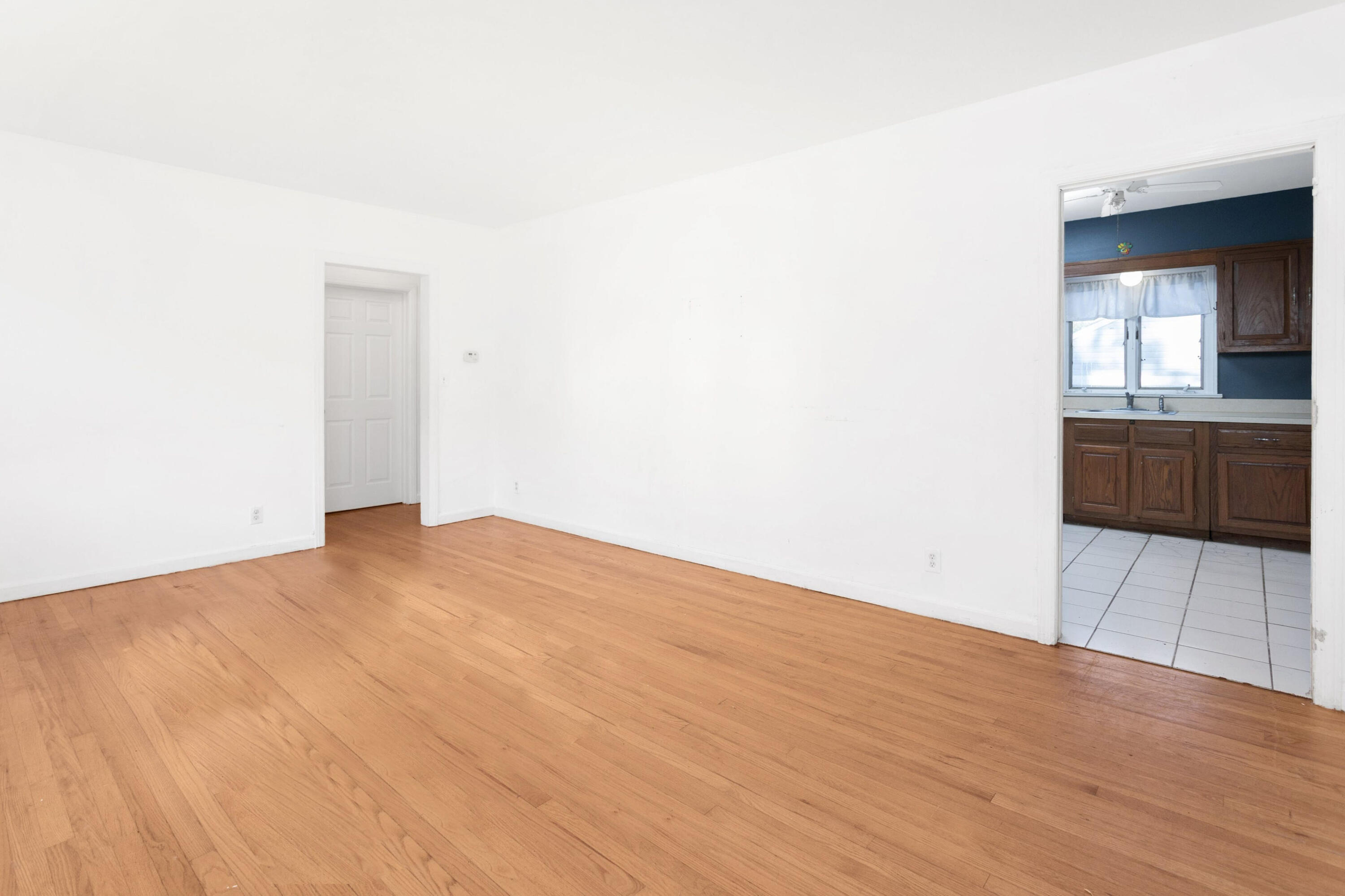 18 Ledge Road Darien, CT 06820 - Photo 7 of 16 a view of an empty room with a kitchen