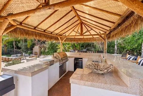 a view of a patio with swimming pool