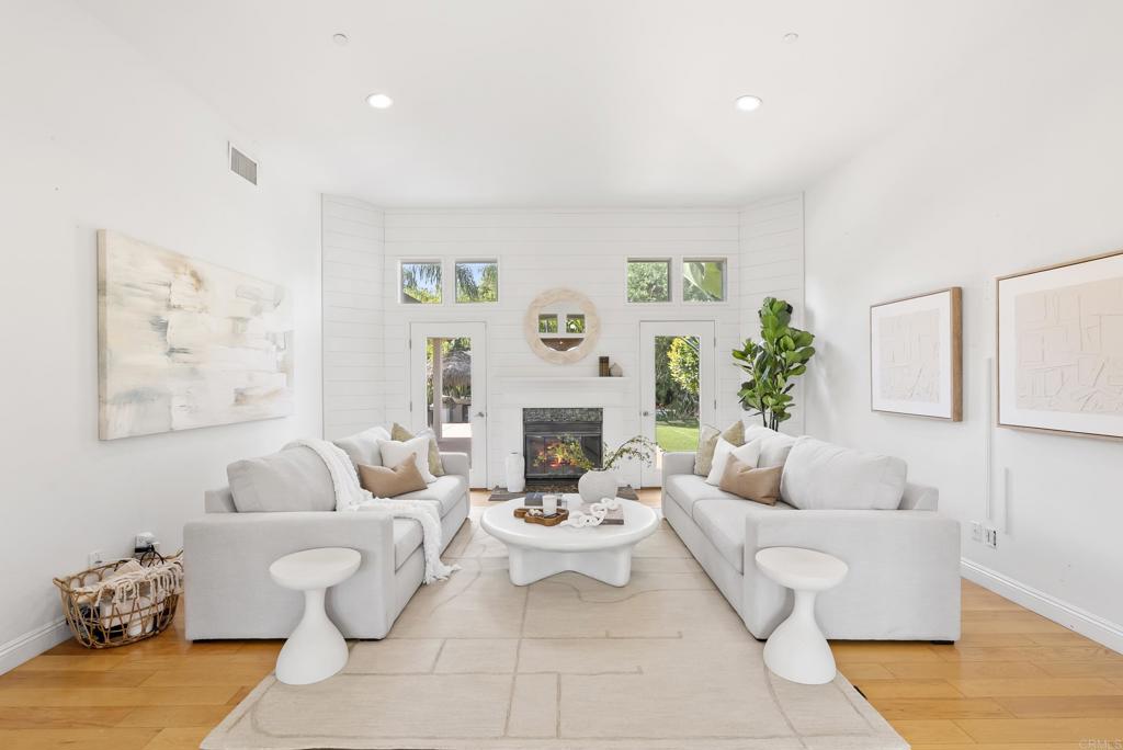 17412 La Brisa Rancho Santa Fe, CA 92067 - Photo 4 of 37 a living room with furniture and a fireplace