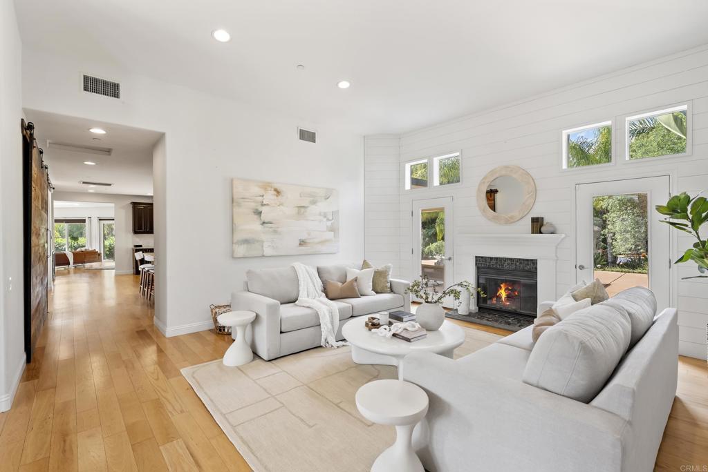 17412 La Brisa Rancho Santa Fe, CA 92067 - Photo 5 of 37 a living room with furniture and a fireplace